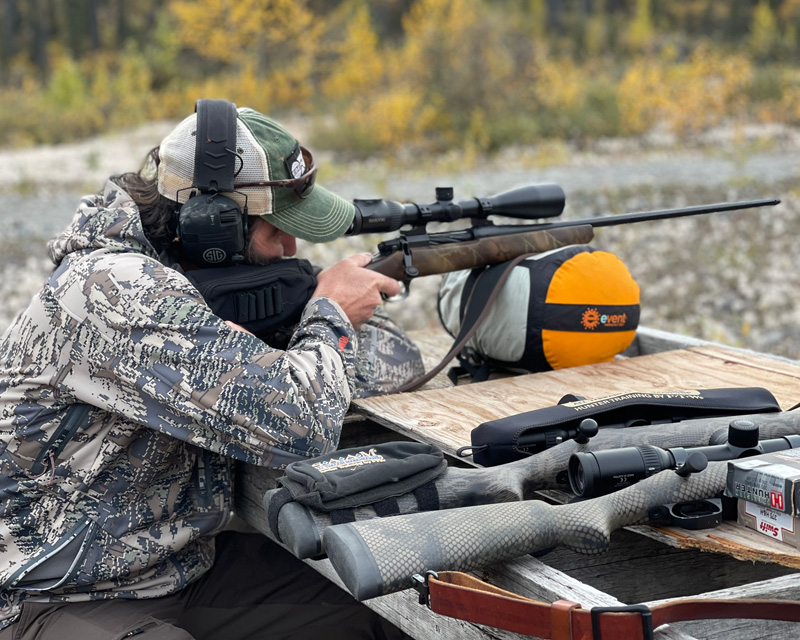 Carr-sighting-in-rifle